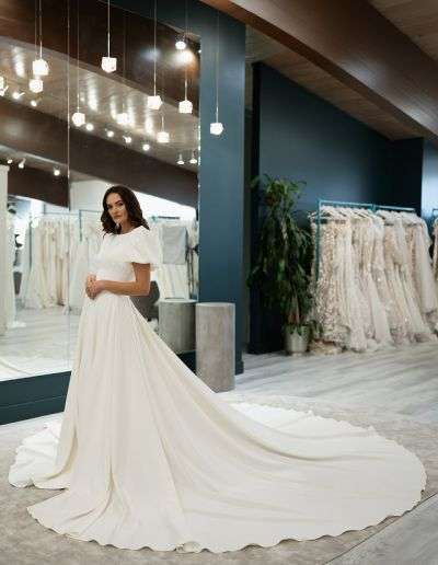 long train modest wedding dress with puff sleeves