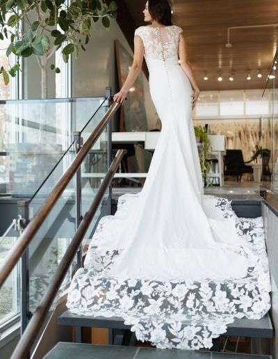 modest lace and crepe wedding dress with long train