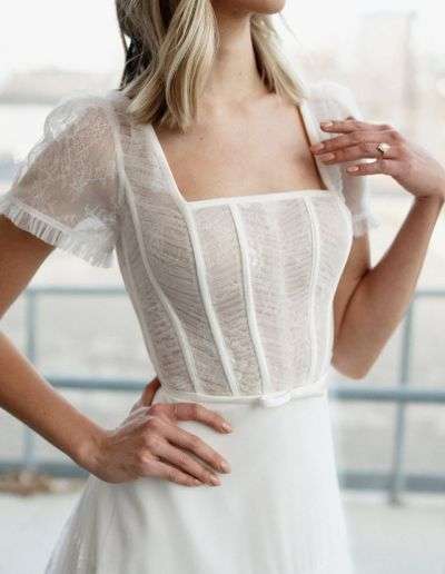 Modest corset wedding dress with lace and sleeves