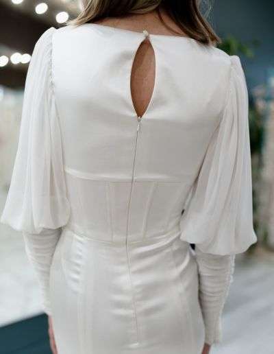 modest wedding gown with boning and bishop sleeves