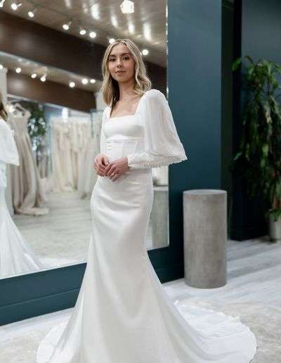 modest square neckline wedding gown with bishop sleeves and fitted cuff